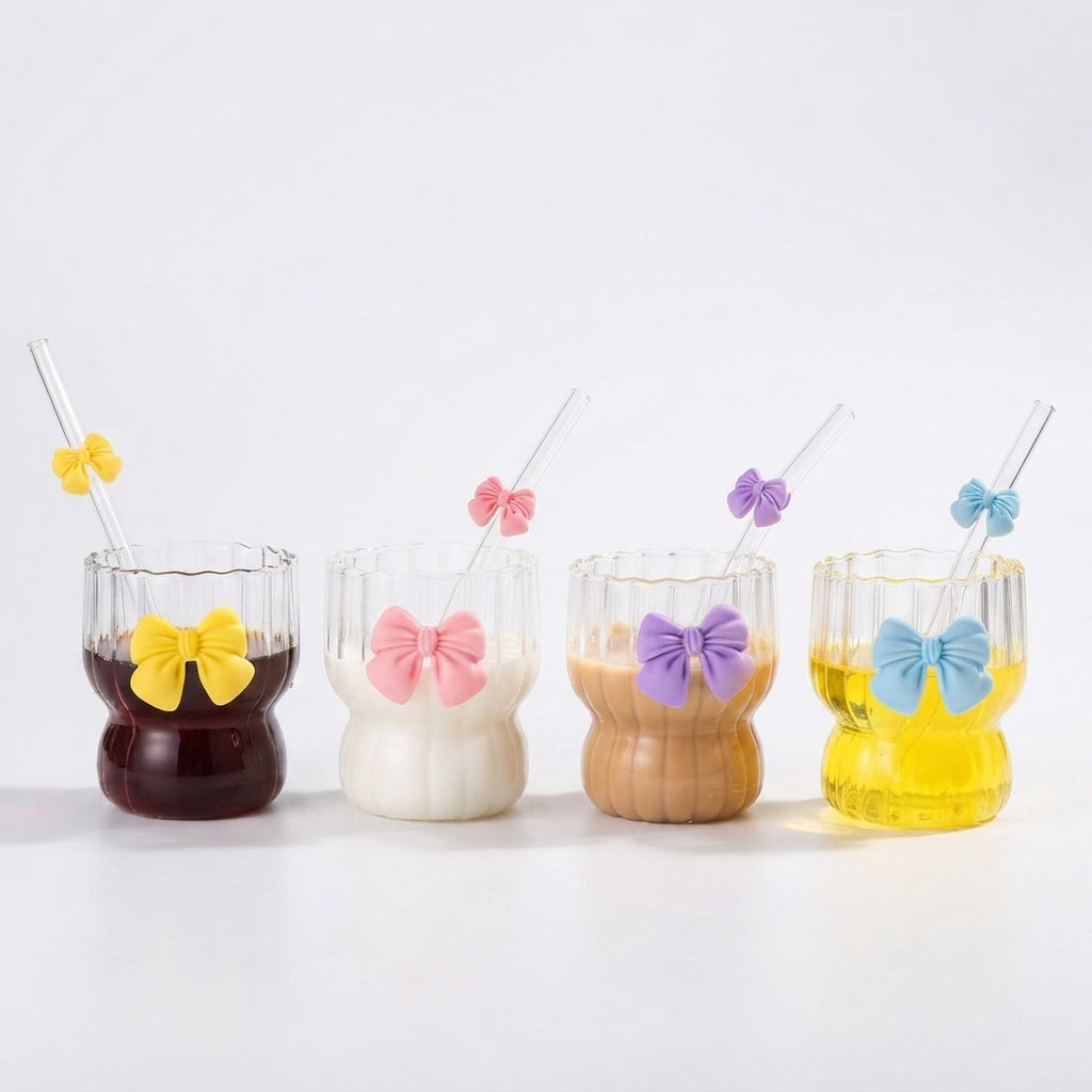 Ripple-textured glass tumbler featuring a signature 3D bow