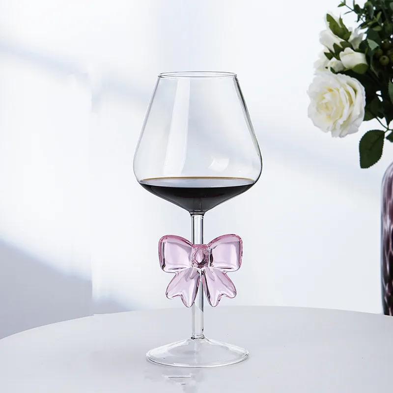 Whimsical glassware featuring hand-sculpted butterfly